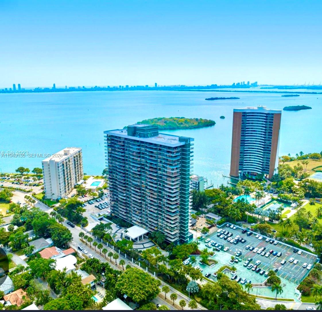 a view of a garden and lake
