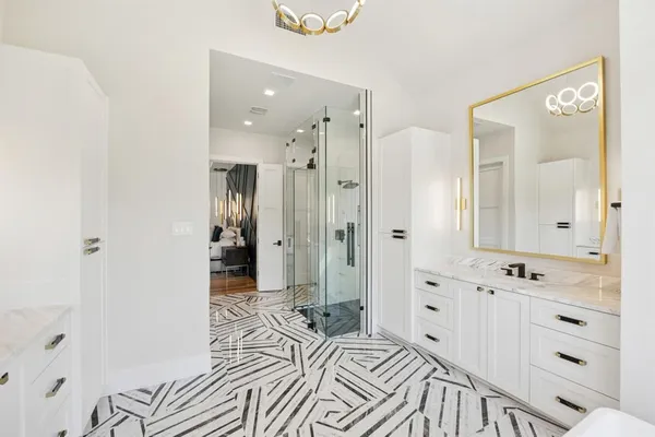 a bedroom with a bed and a walk in closet