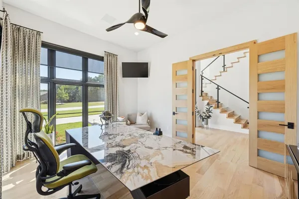 a view of a dining room with furniture window and outside view