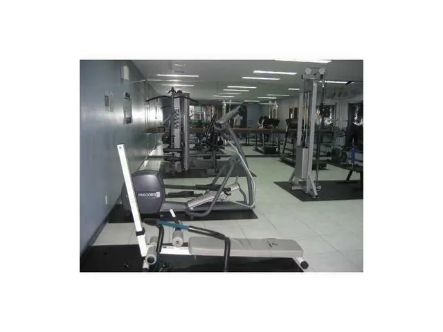 a picture of a room with gym equipment