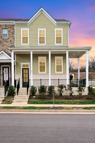 a view of a house with a porch