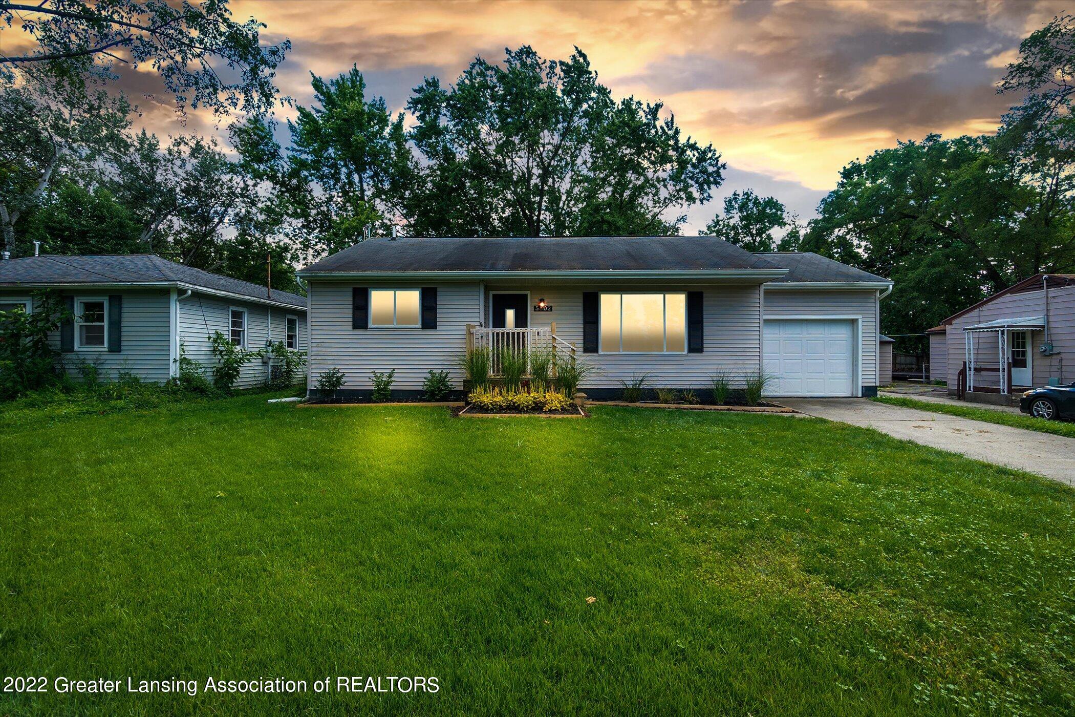 5802 Hughes Road Lansing, MI 48911 - Photo 2 of 37 01-5802-Hughes-Rd-WindowStill-Real-Estat