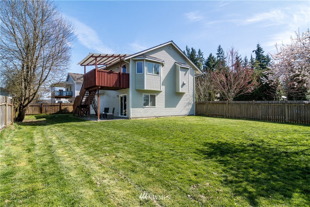 7432 Upper Ridge Road Everett, WA 98203 - Photo 2 of 32 a view of a house with backyard and a tree