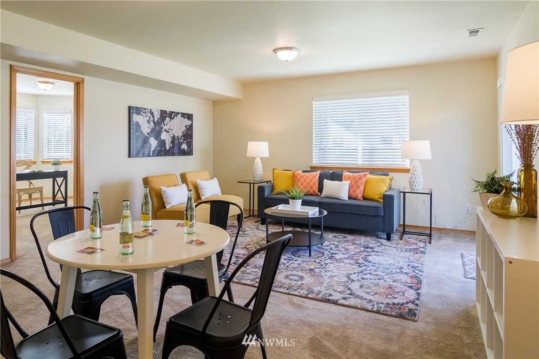 7432 Upper Ridge Road Everett, WA 98203 - Photo 20 of 32 a living room with furniture and a rug