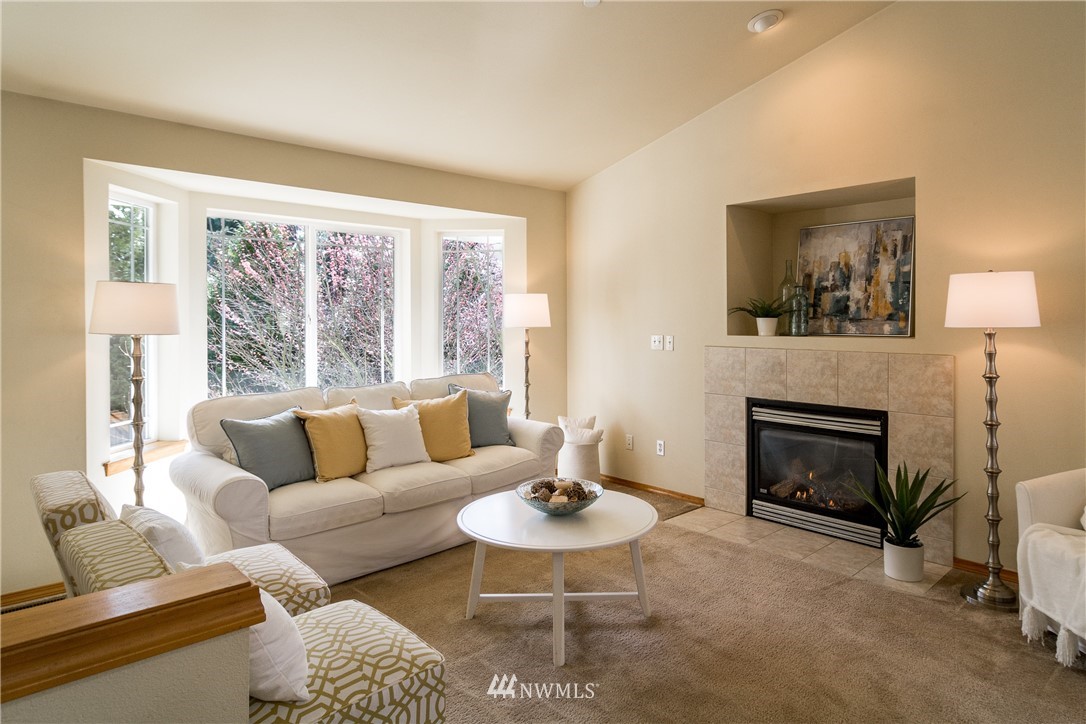 7432 Upper Ridge Road Everett, WA 98203 - Photo 3 of 32 a living room with furniture and a fireplace