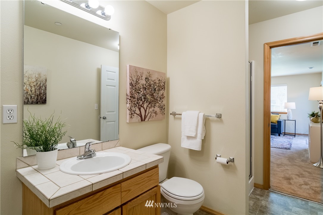 7432 Upper Ridge Road Everett, WA 98203 - Photo 25 of 32 a bathroom with a sink toilet and shower
