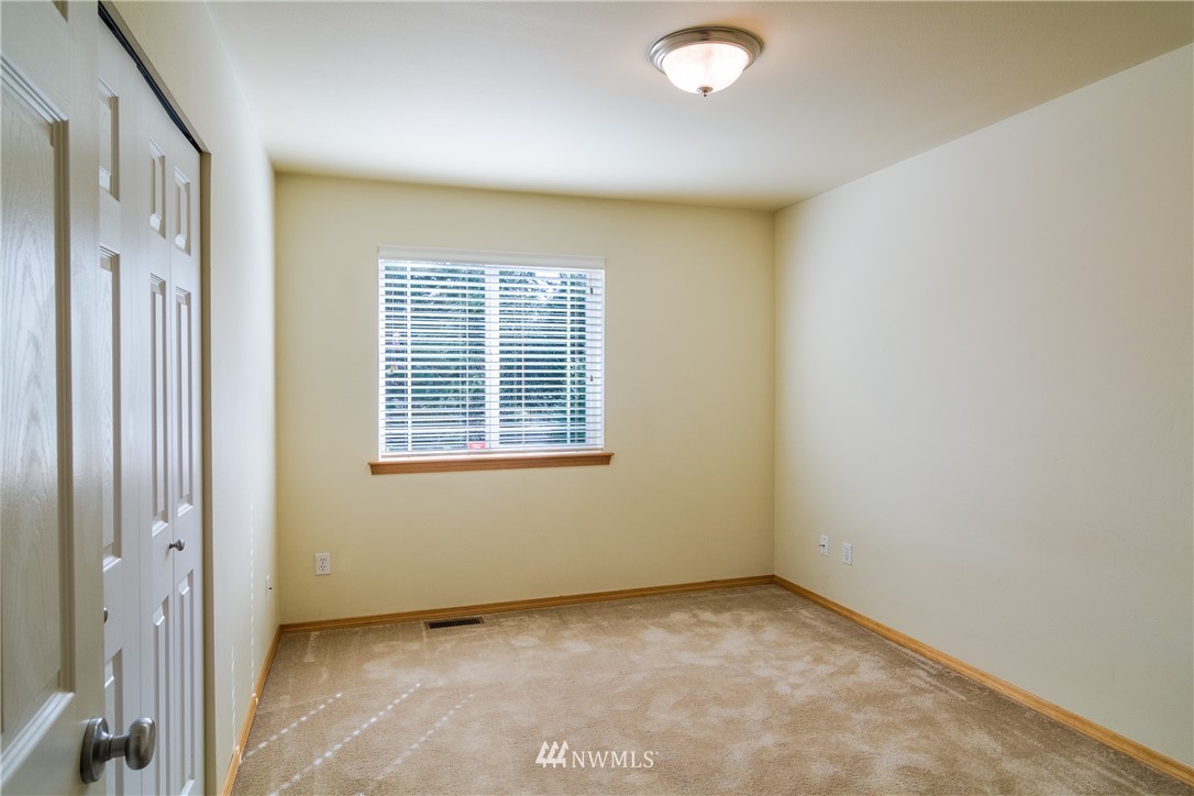 7432 Upper Ridge Road Everett, WA 98203 - Photo 26 of 32 a view of an empty room with a window