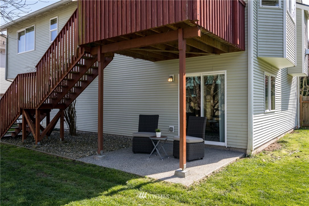 7432 Upper Ridge Road Everett, WA 98203 - Photo 31 of 32 a view of a house with backyard and porch