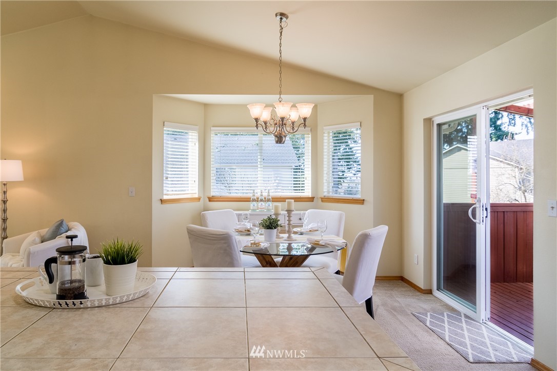 7432 Upper Ridge Road Everett, WA 98203 - Photo 7 of 32 a dining room with furniture and window