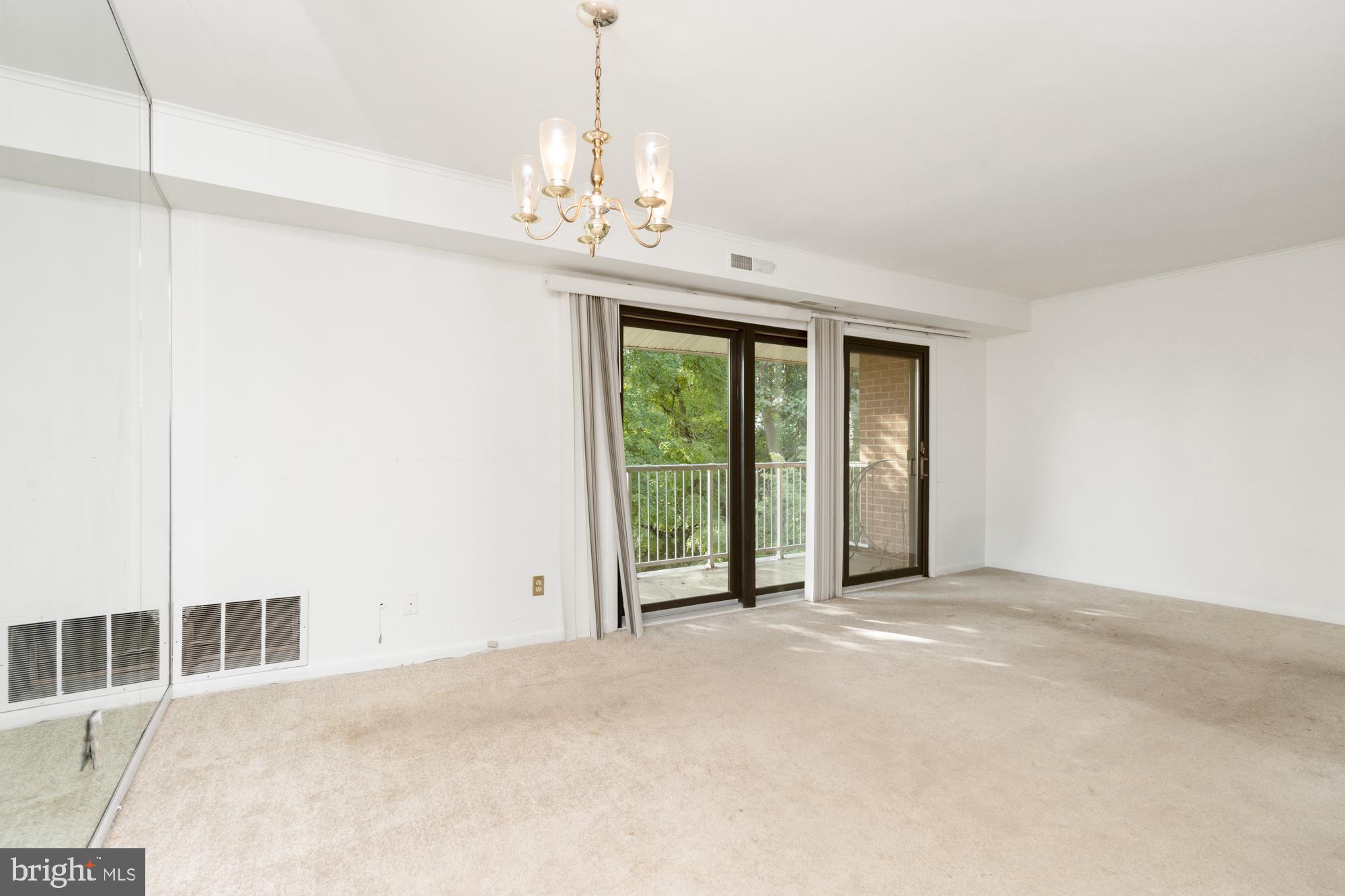 101 Fitz Court, Unit 202 Reisterstown, MD 21136 - Photo 11 of 27 a view of an empty room with a window