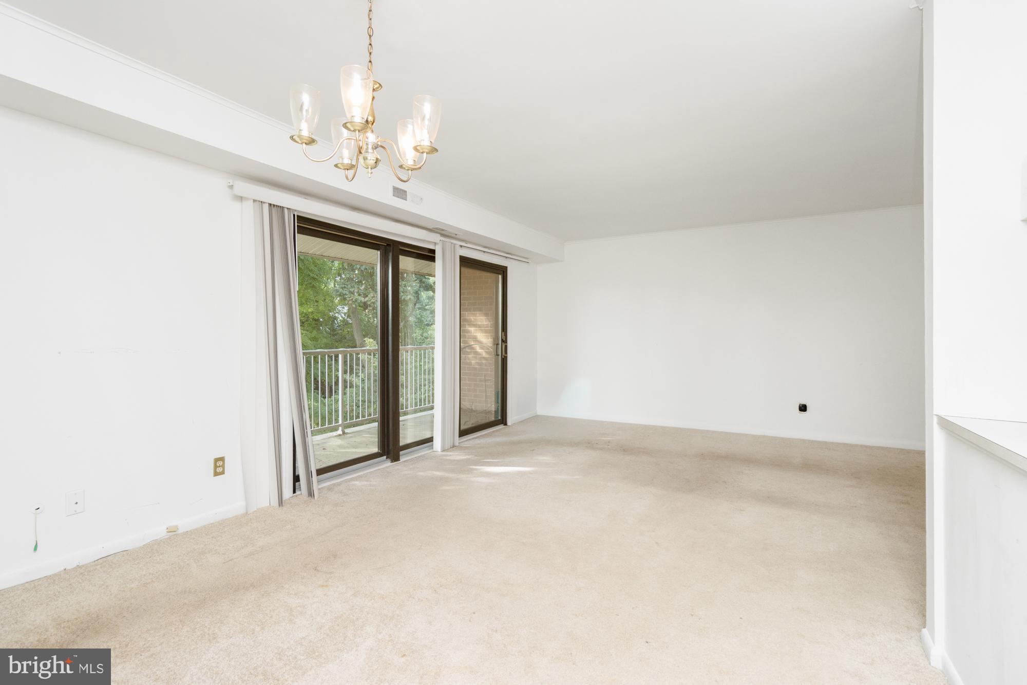 101 Fitz Court, Unit 202 Reisterstown, MD 21136 - Photo 12 of 27 a view of an empty room with a window