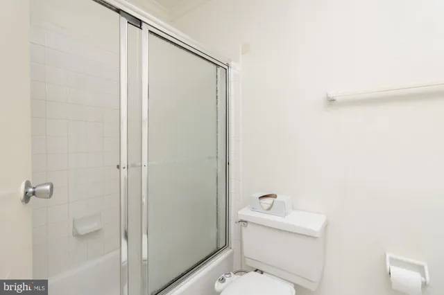 an empty room with a windows