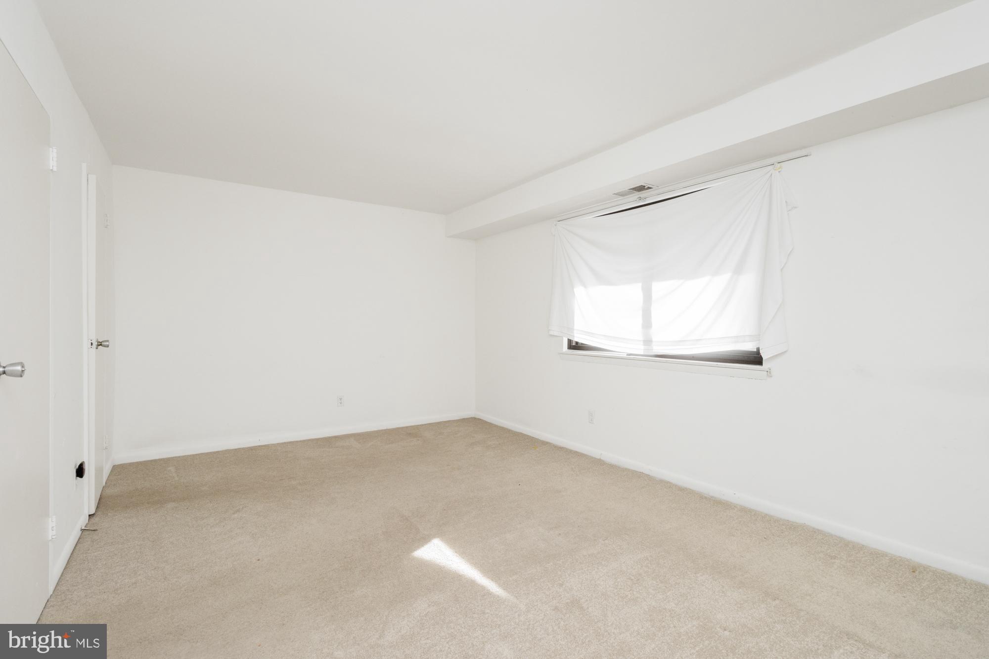 101 Fitz Court, Unit 202 Reisterstown, MD 21136 - Photo 20 of 27 an empty room with a windows