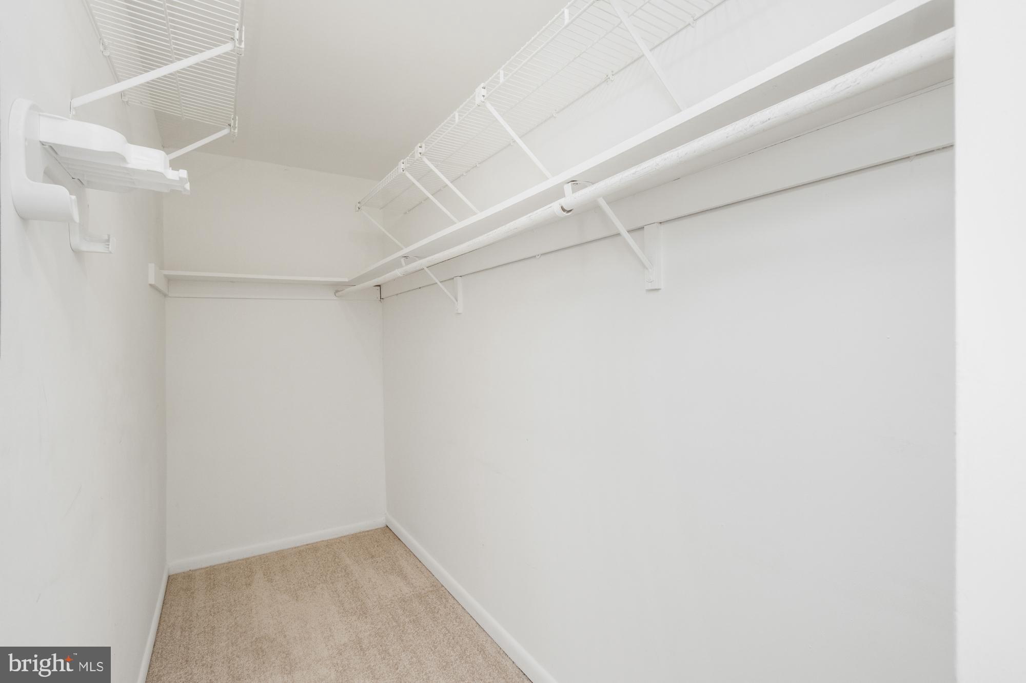 101 Fitz Court, Unit 202 Reisterstown, MD 21136 - Photo 23 of 27 a view of a room with racks on the wall