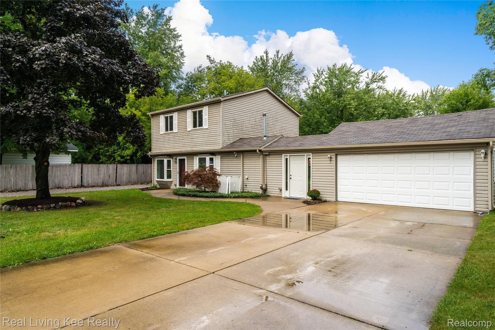 1928 Tamm Avenue Rochester, MI 48309 - Photo 3 of 41 Oversized 2-Car Garage with Breezeway