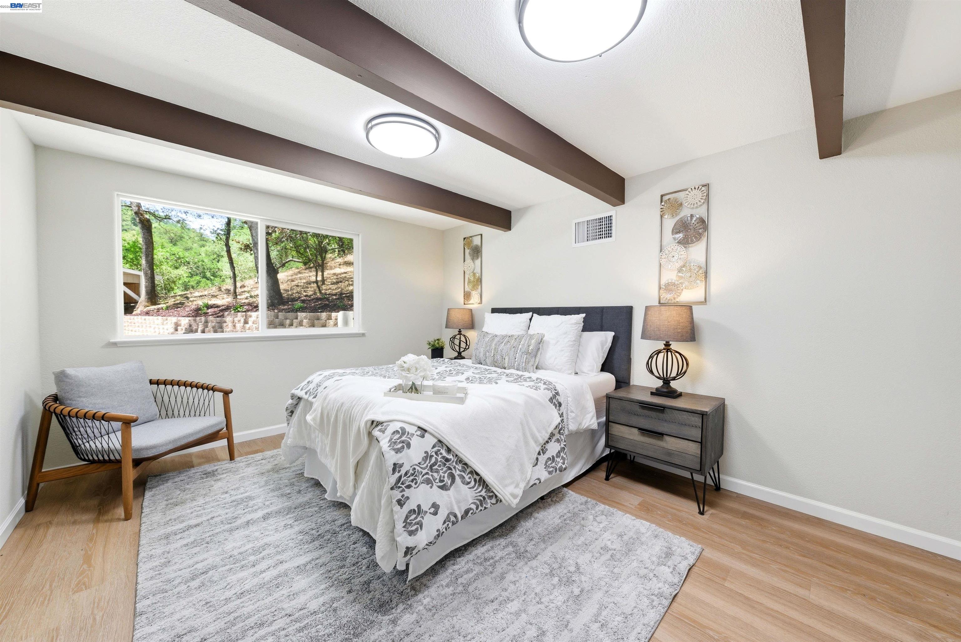 1929 Kilkare Road Sunol, CA 94586 - Photo 18 of 24 a bedroom with bed and a window