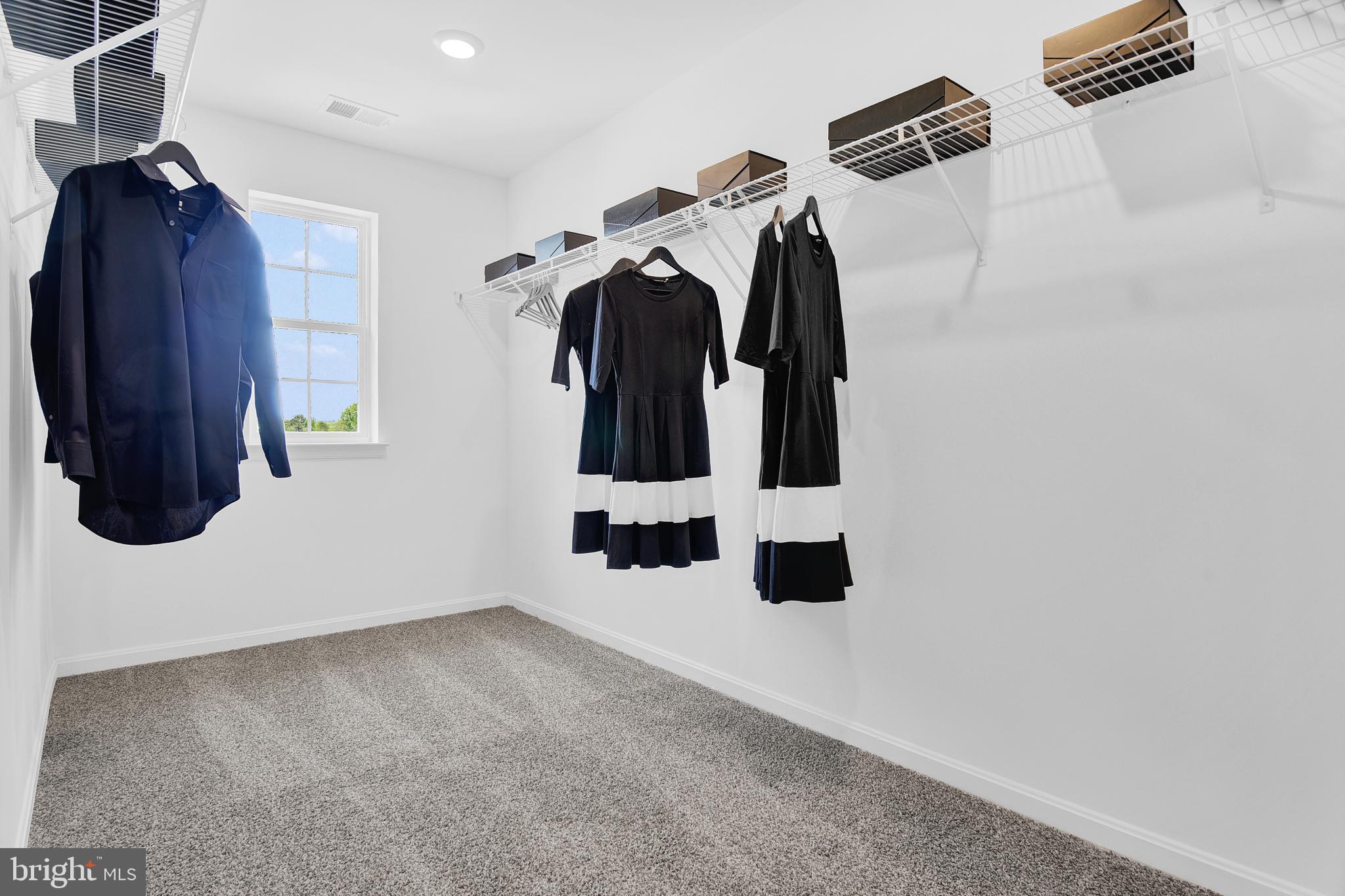978 Pagonia Road Joppa, MD 21085 - Photo 21 of 34 a view of walk in closet with clothes and shoes