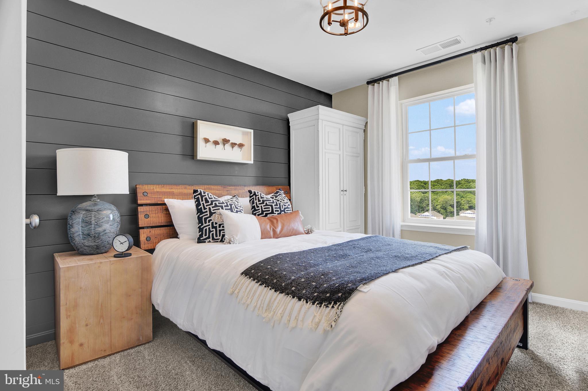 978 Pagonia Road Joppa, MD 21085 - Photo 27 of 34 a bedroom with a large bed and a window