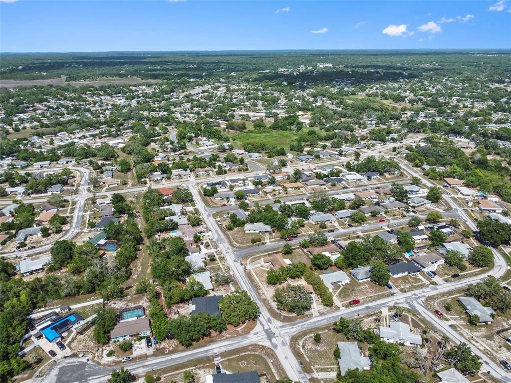 6221 Dalton Street Spring Hill, FL 34606 - Photo 39 of 40 an aerial view of residential houses with city view