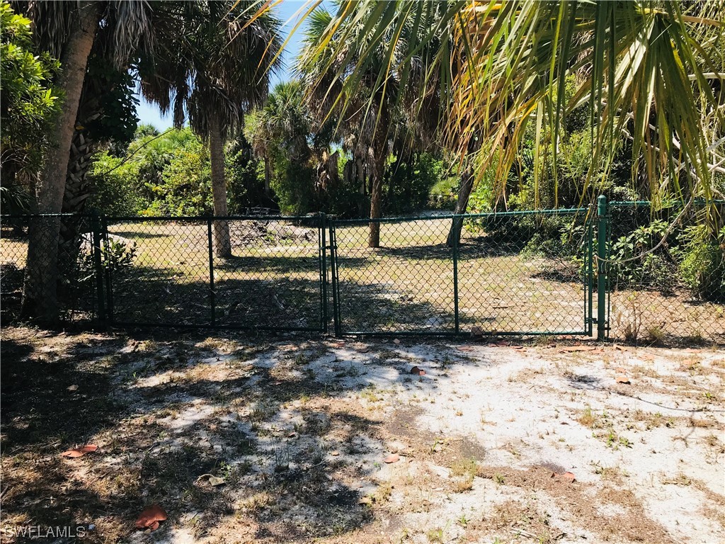 4441 Cutlass Drive Captiva, FL 33924 - Photo 7 of 9 a view of a backyard