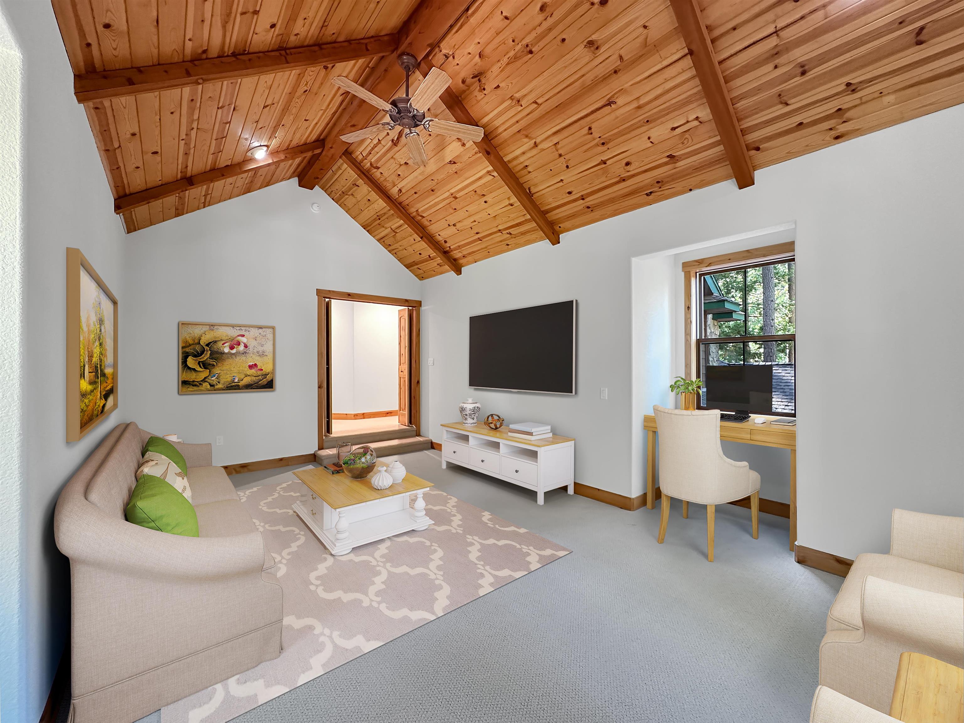 1025 Carmichael Road Clio, CA 96106 - Photo 17 of 21 a living room with furniture and a flat screen tv