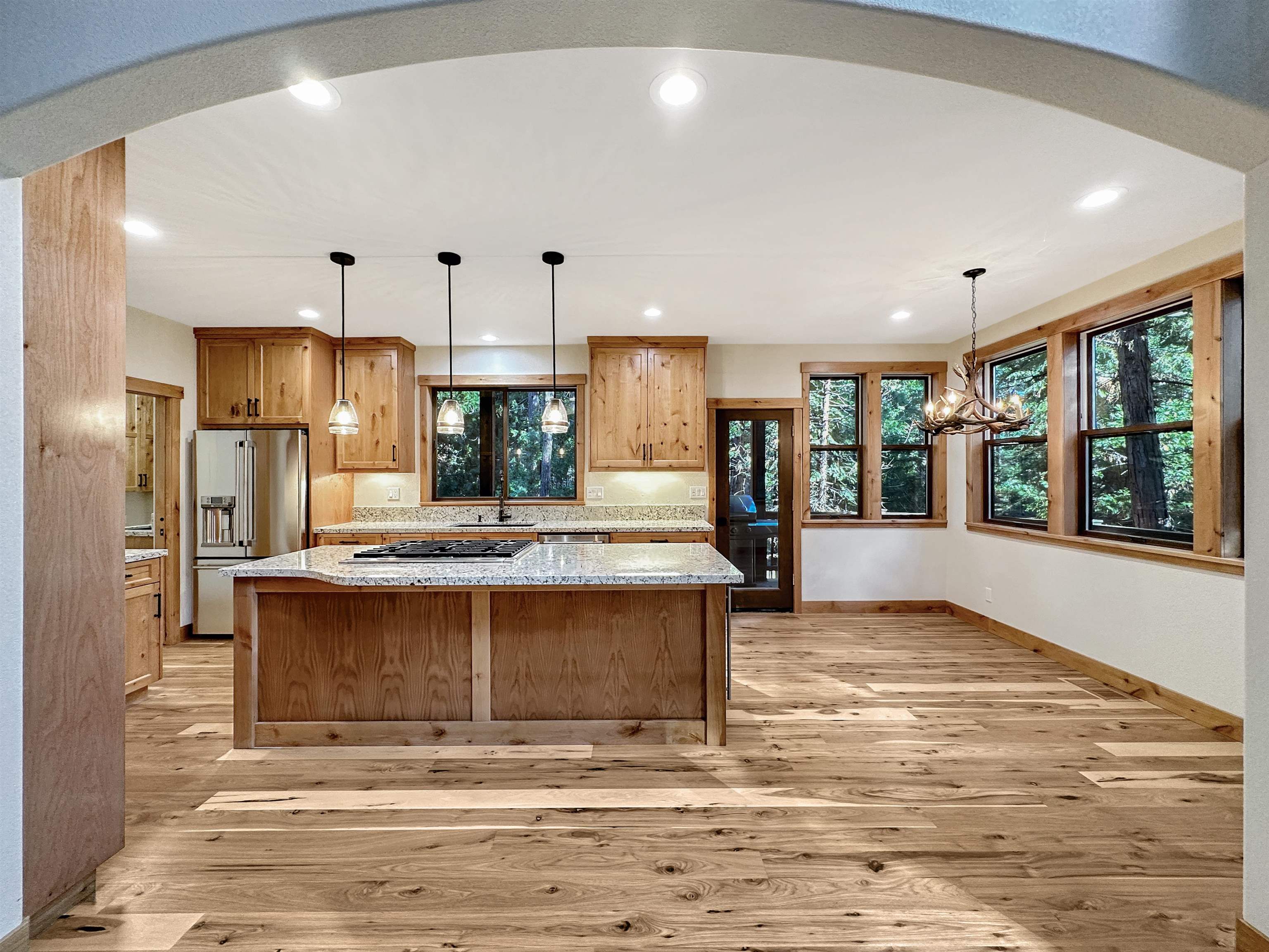 1025 Carmichael Road Clio, CA 96106 - Photo 6 of 21 a view of kitchen with stainless steel appliances granite countertop a stove and a refrigerator