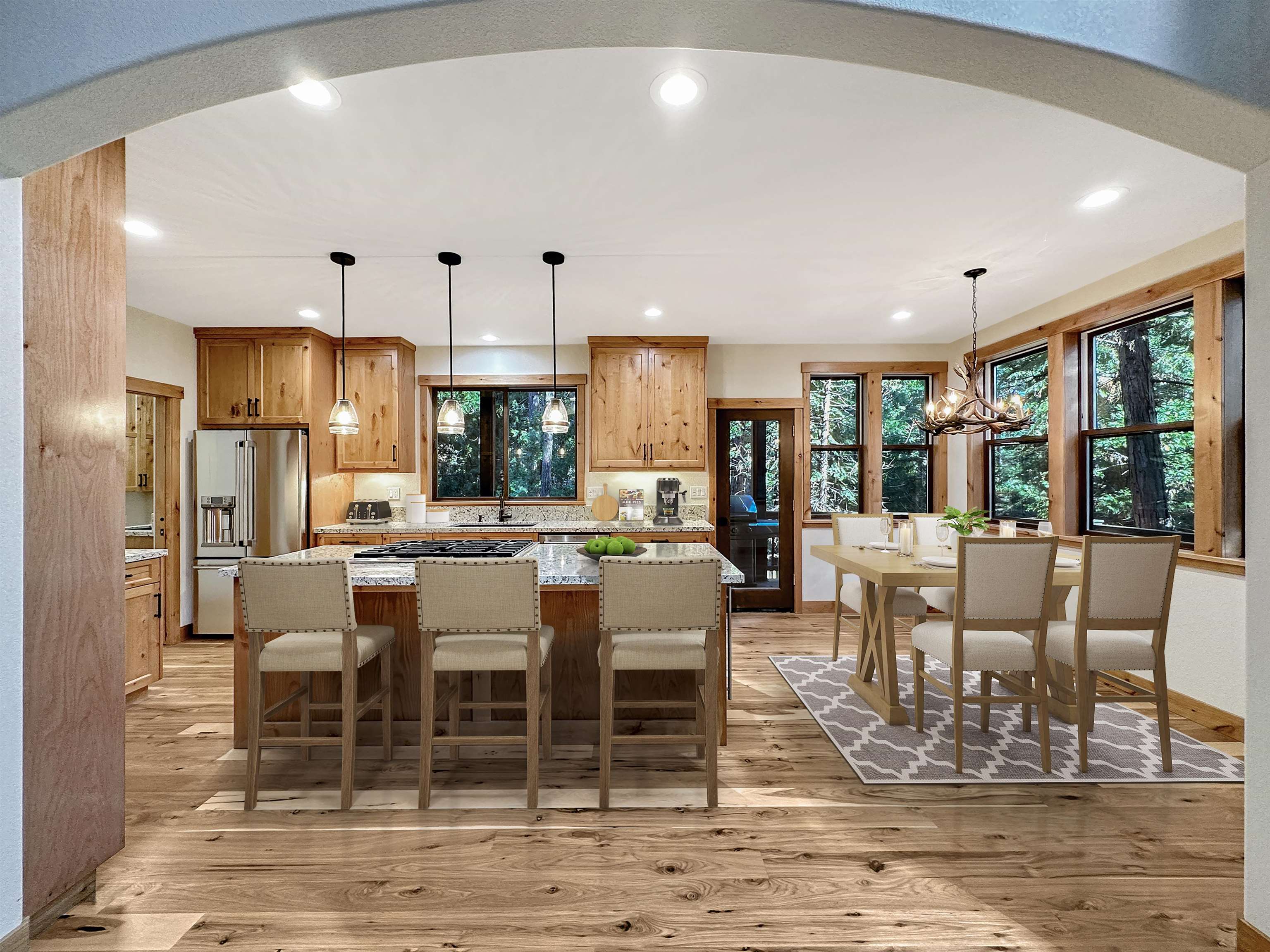 1025 Carmichael Road Clio, CA 96106 - Photo 7 of 21 a large kitchen with a table and chairs