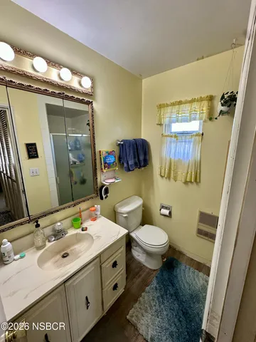 a kitchen with stainless steel appliances a refrigerator sink and stove