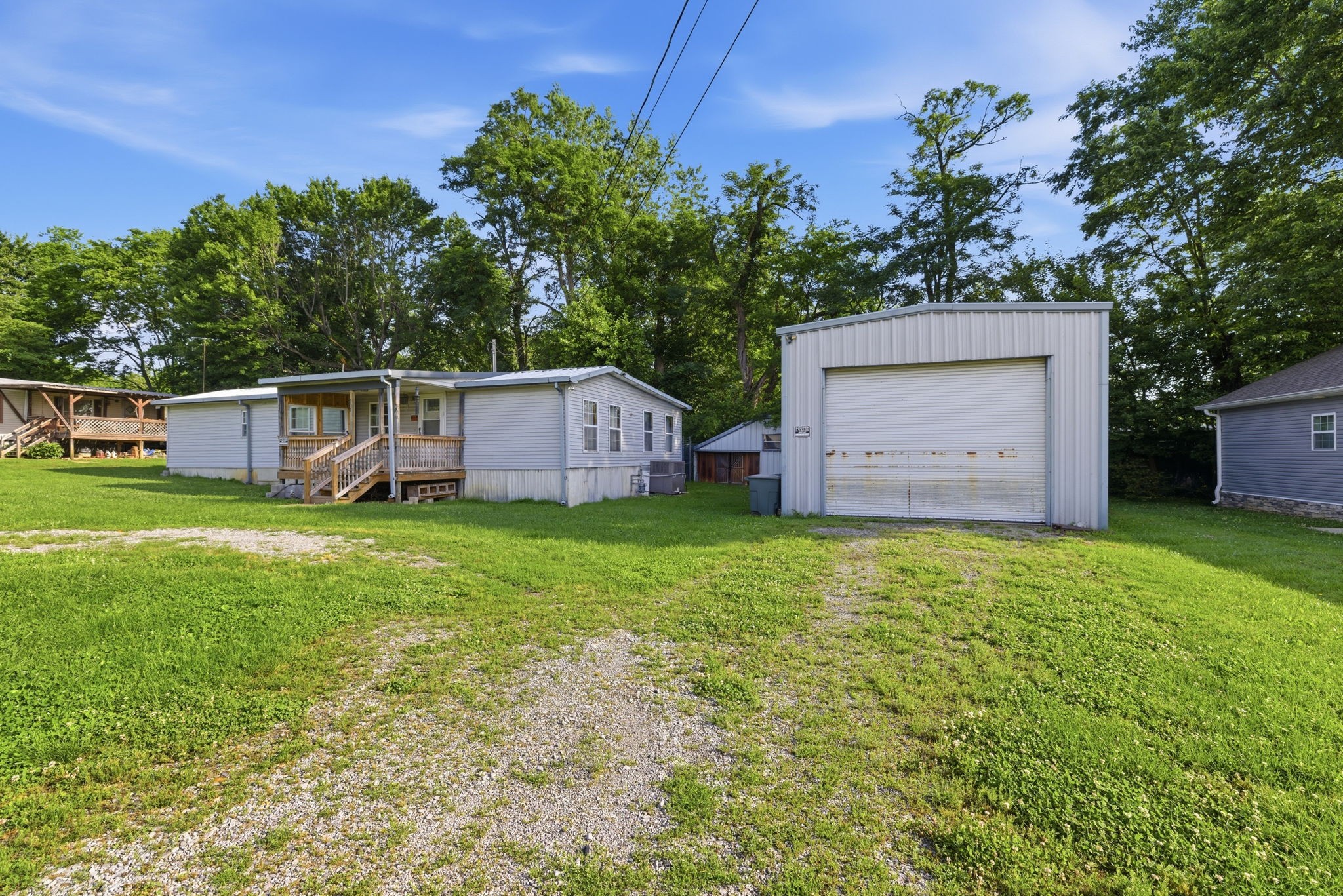 207 Center Street Portland, TN 37148 - Photo 1 of 26 a house view with a garden space