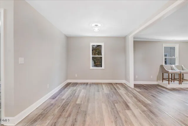 a view of a livingroom with wooden floor