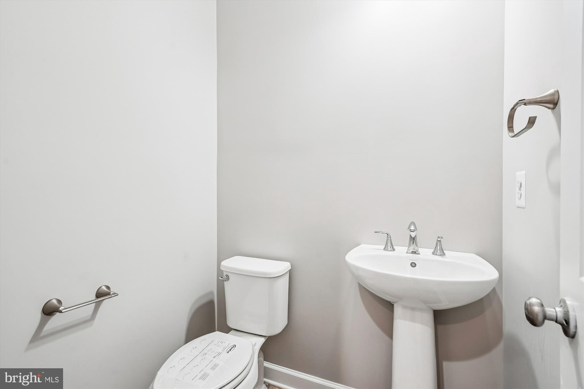 292 Colebrook Road Fredericksburg, VA 22405 - Photo 23 of 67 a bathroom with a sink toilet and a mirror