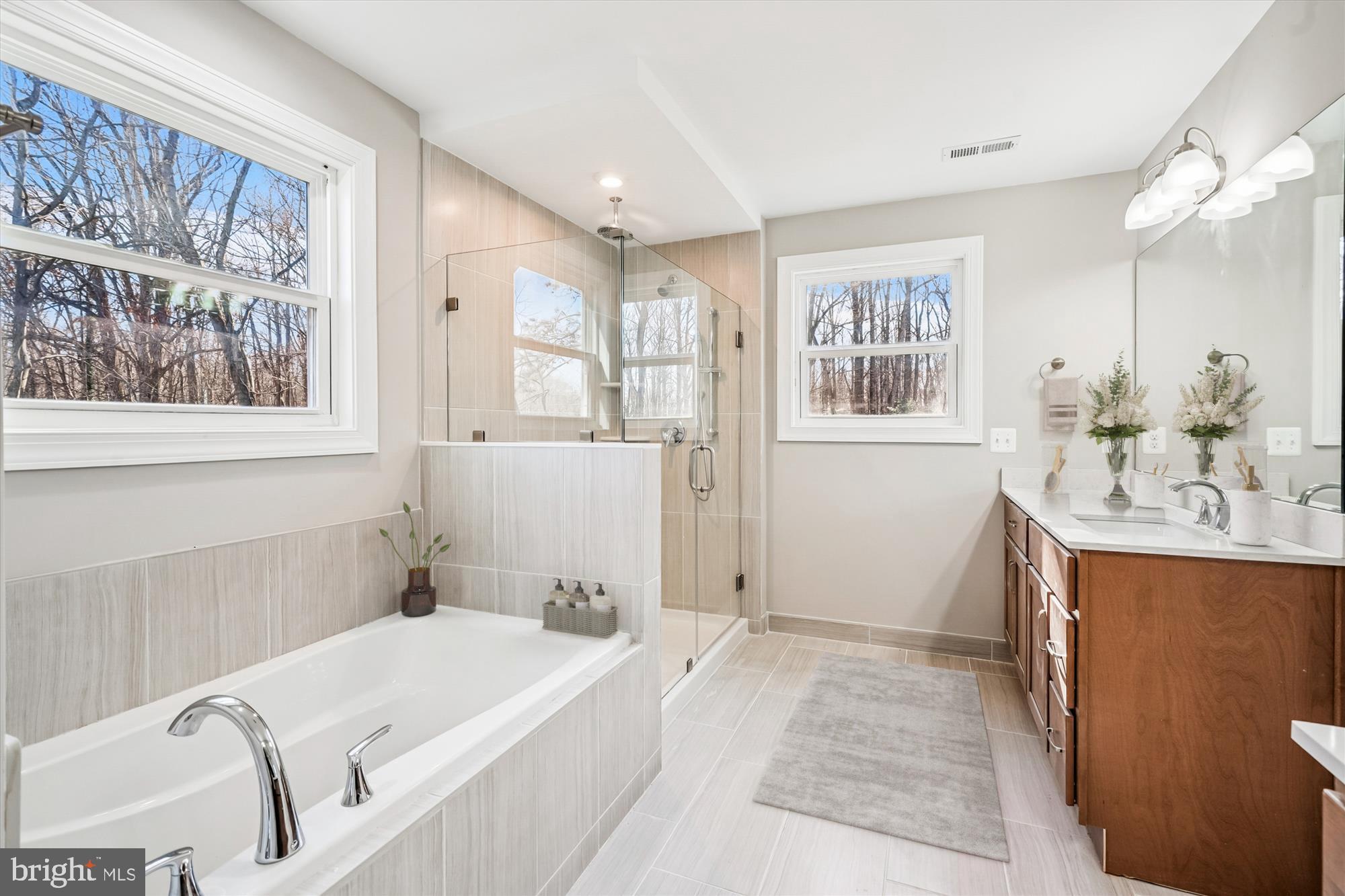 292 Colebrook Road Fredericksburg, VA 22405 - Photo 31 of 67 a bathroom with a tub sink and mirror