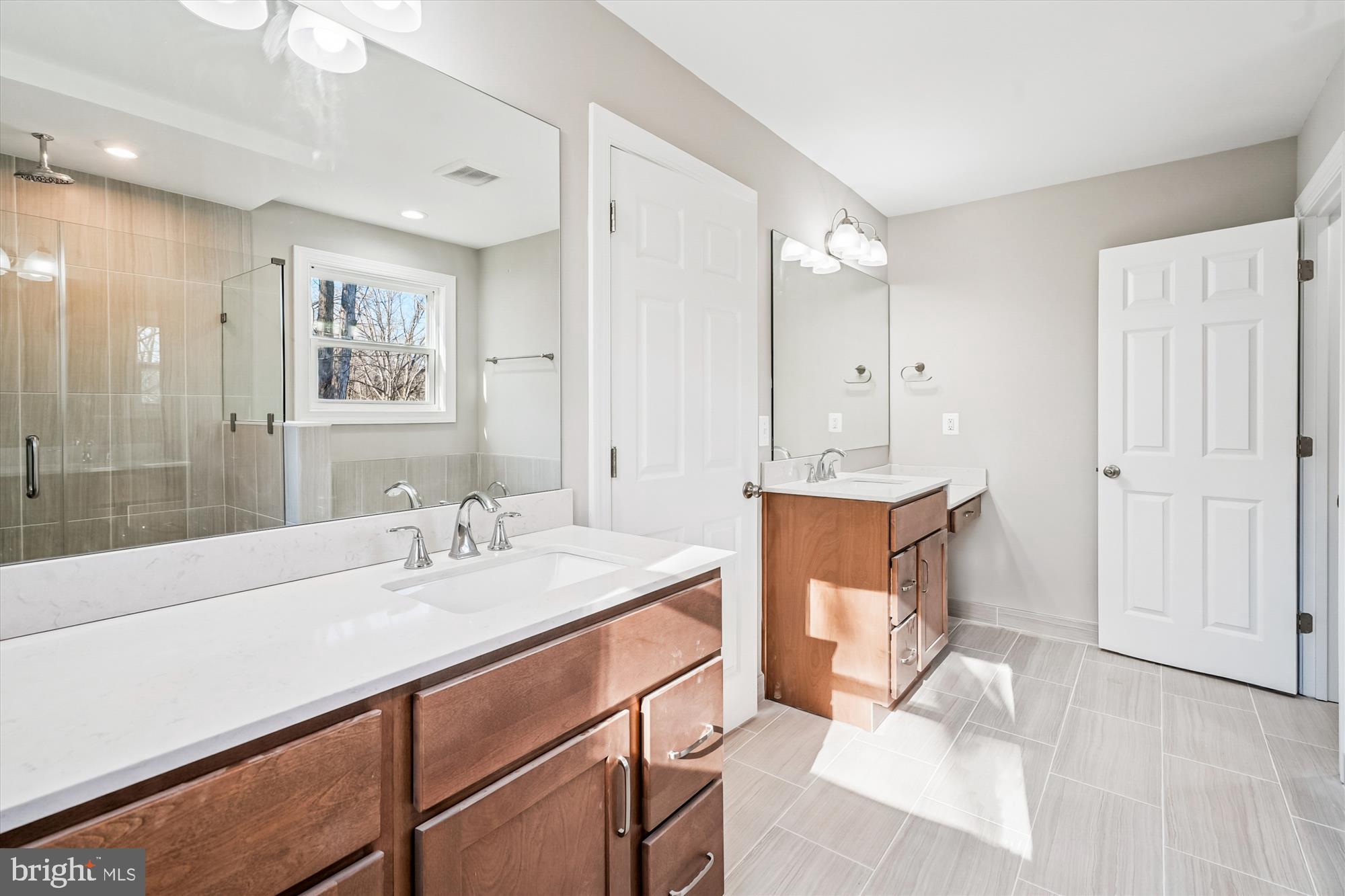 292 Colebrook Road Fredericksburg, VA 22405 - Photo 33 of 67 a bathroom with a sink double vanity and a mirror