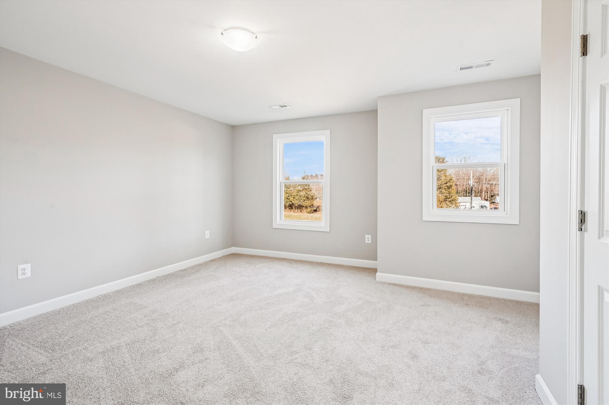 292 Colebrook Road Fredericksburg, VA 22405 - Photo 36 of 67 an empty room with windows and windows