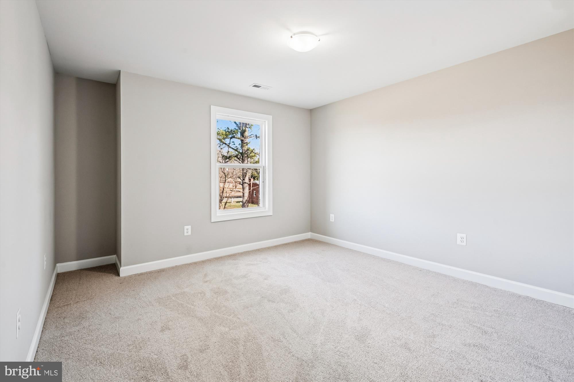 292 Colebrook Road Fredericksburg, VA 22405 - Photo 39 of 67 an empty room with windows and closet