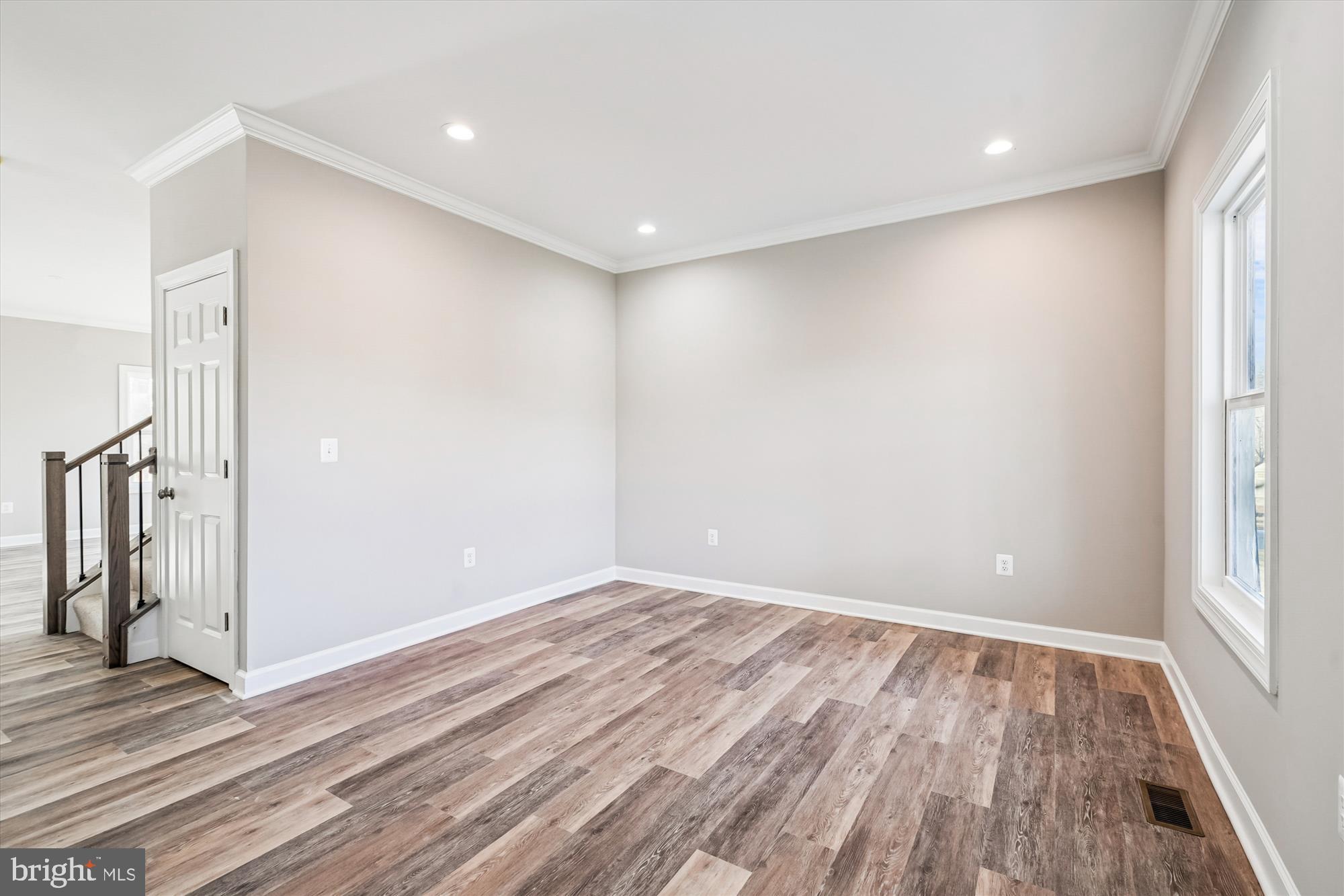 292 Colebrook Road Fredericksburg, VA 22405 - Photo 4 of 67 a view of room with window and wooden floor