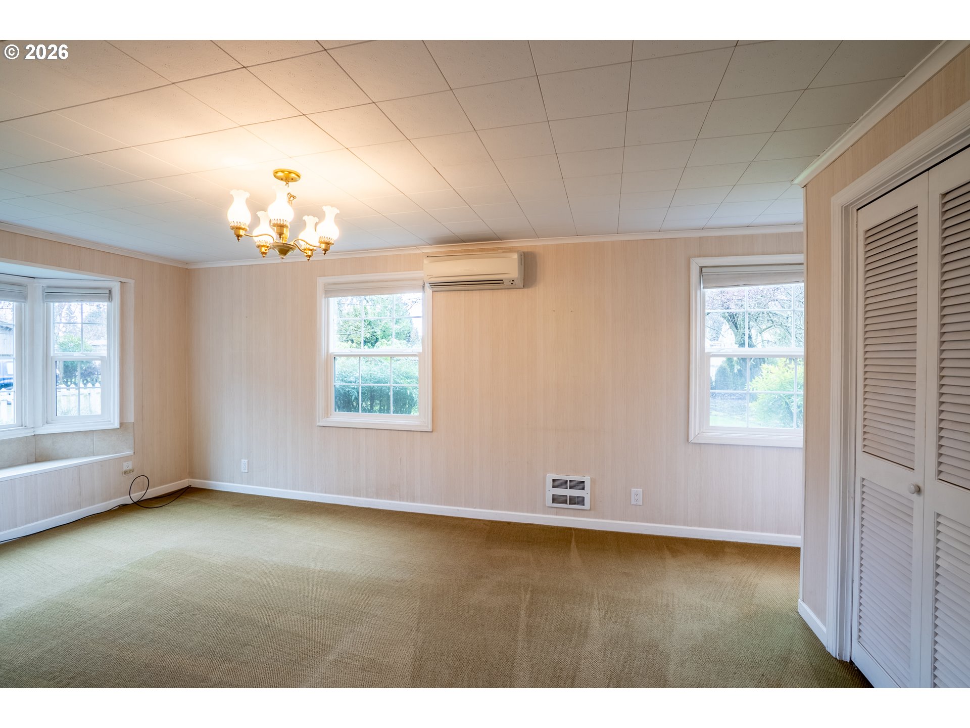 825 Filbert Avenue Eugene, OR 97404 - Photo 13 of 35 a view of an empty room with a window