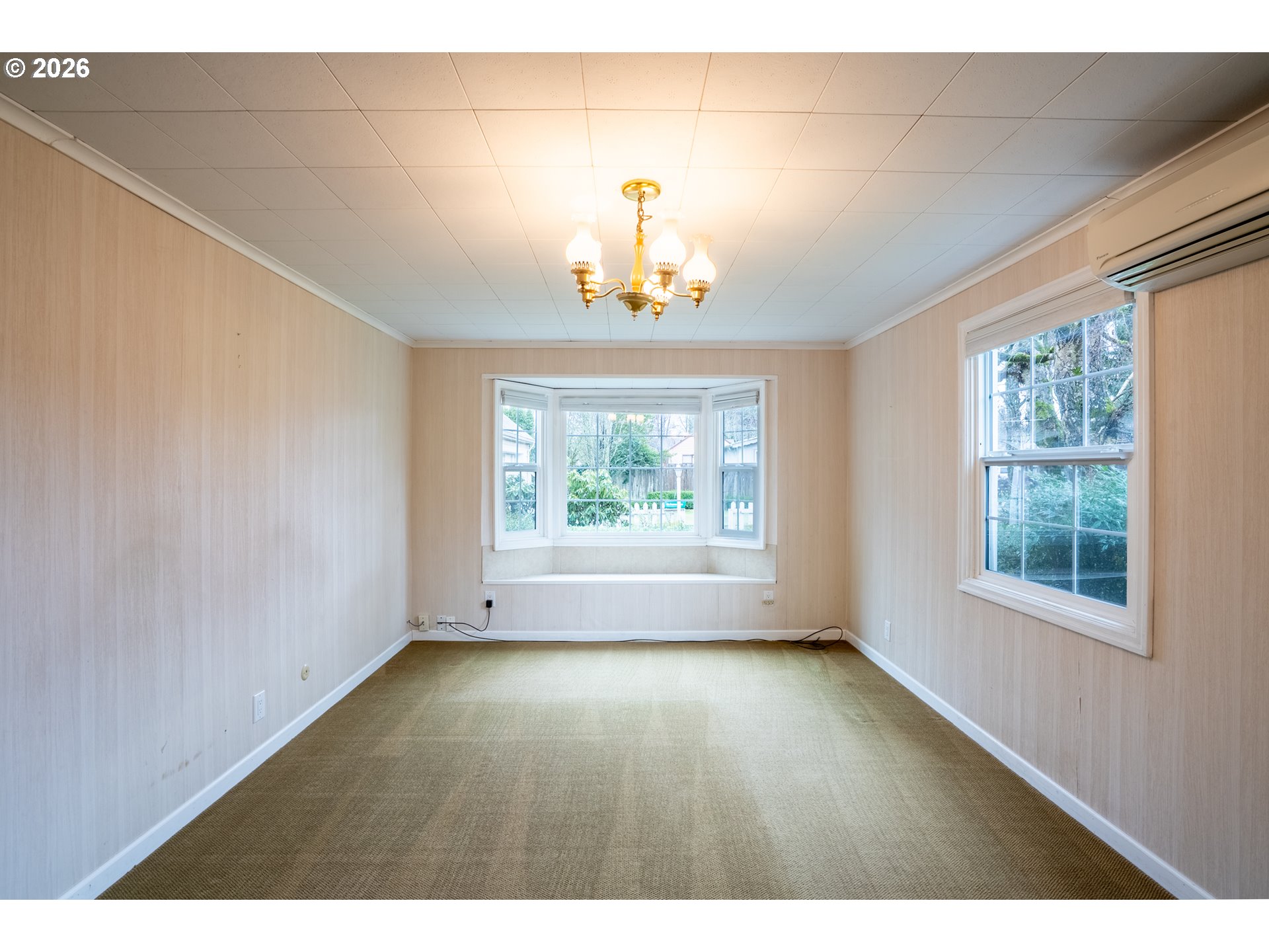 825 Filbert Avenue Eugene, OR 97404 - Photo 14 of 35 a view of an empty room with a window