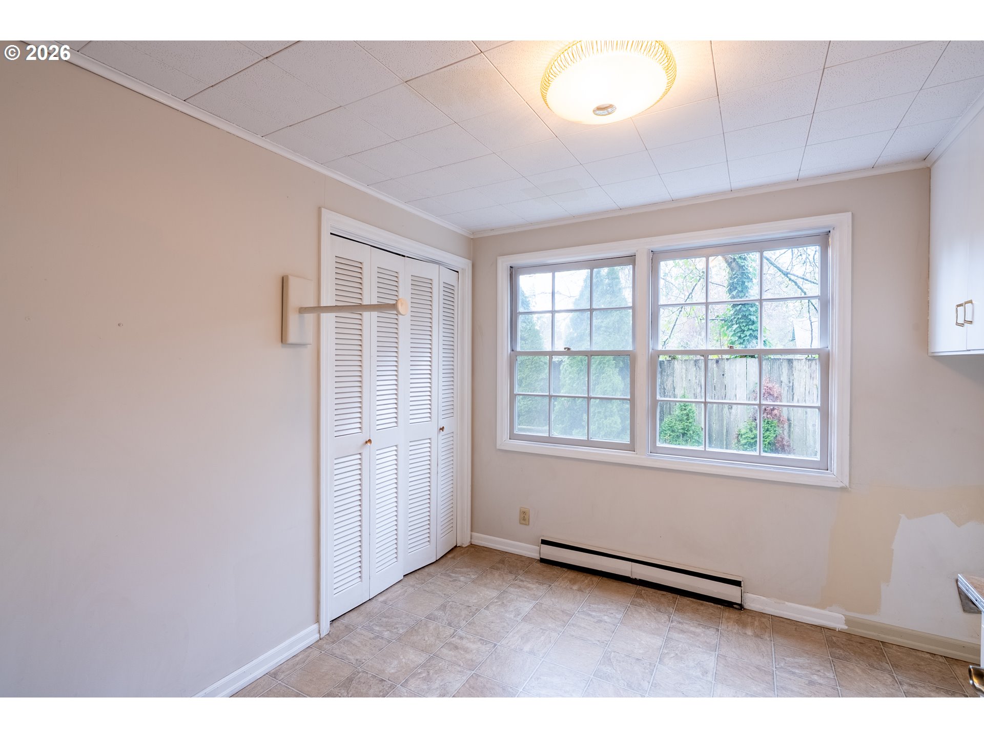 825 Filbert Avenue Eugene, OR 97404 - Photo 17 of 35 an empty room with windows