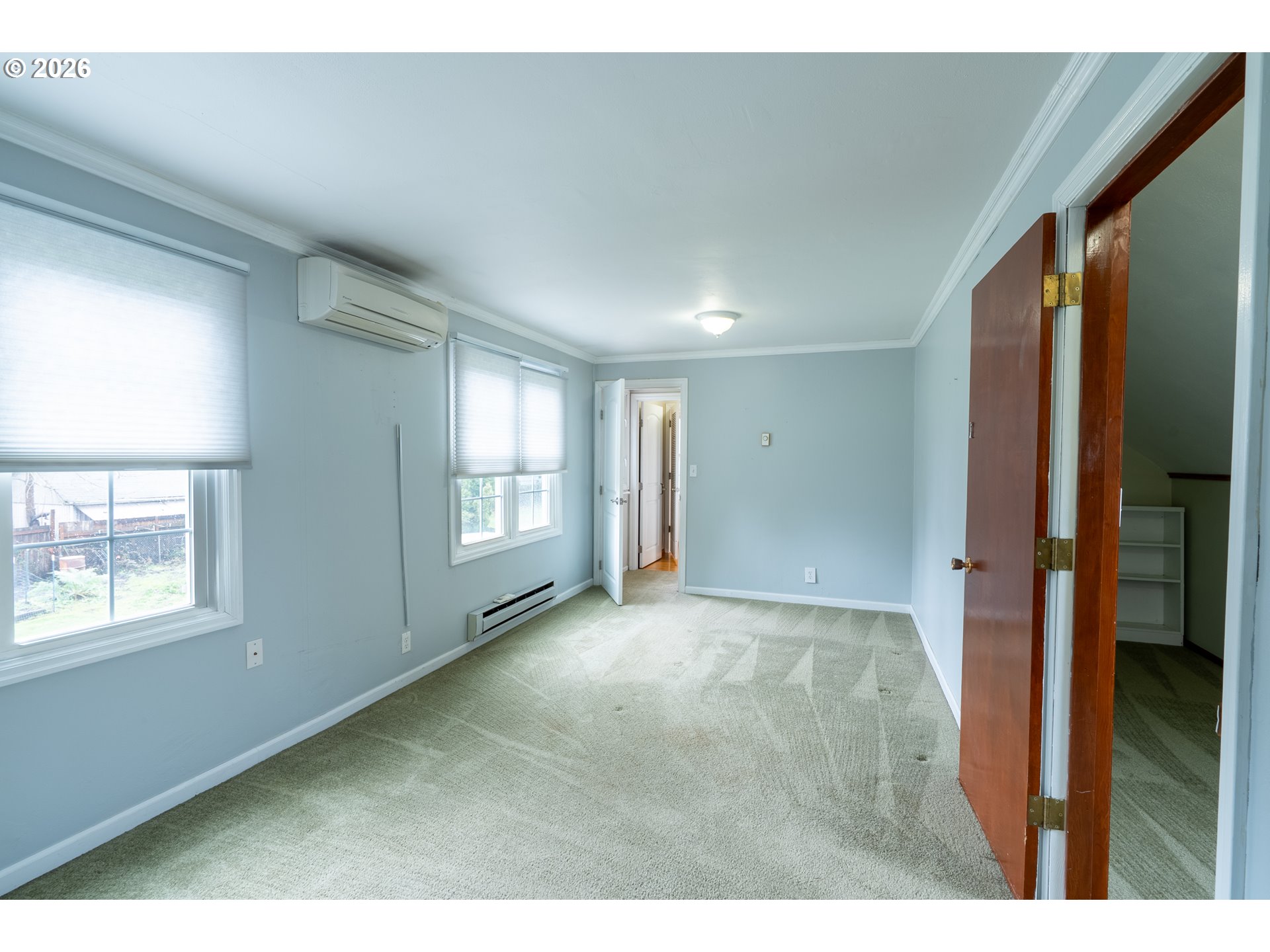 825 Filbert Avenue Eugene, OR 97404 - Photo 23 of 35 a view of an empty room with a window