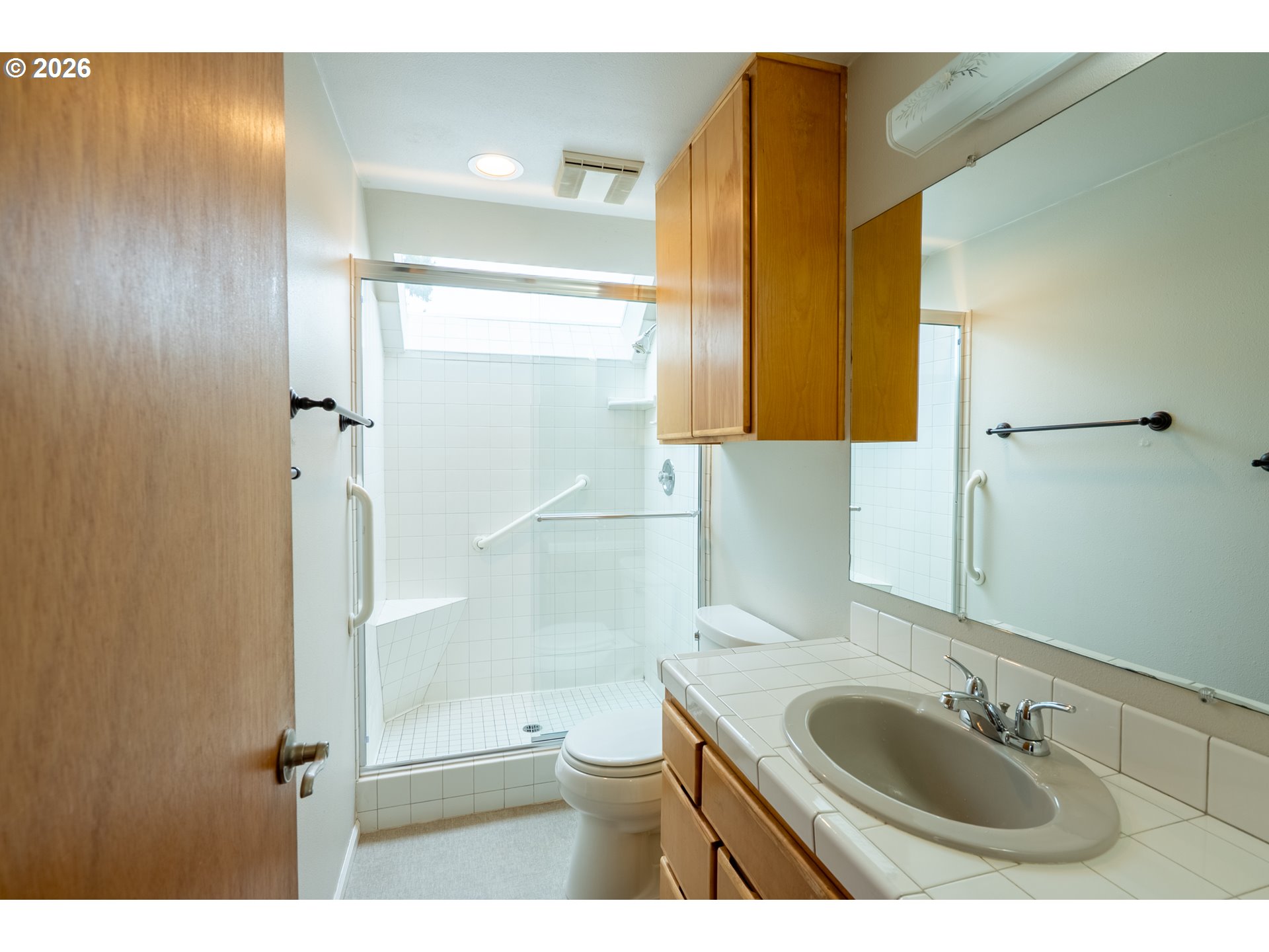 825 Filbert Avenue Eugene, OR 97404 - Photo 29 of 35 a bathroom with a sink toilet and shower