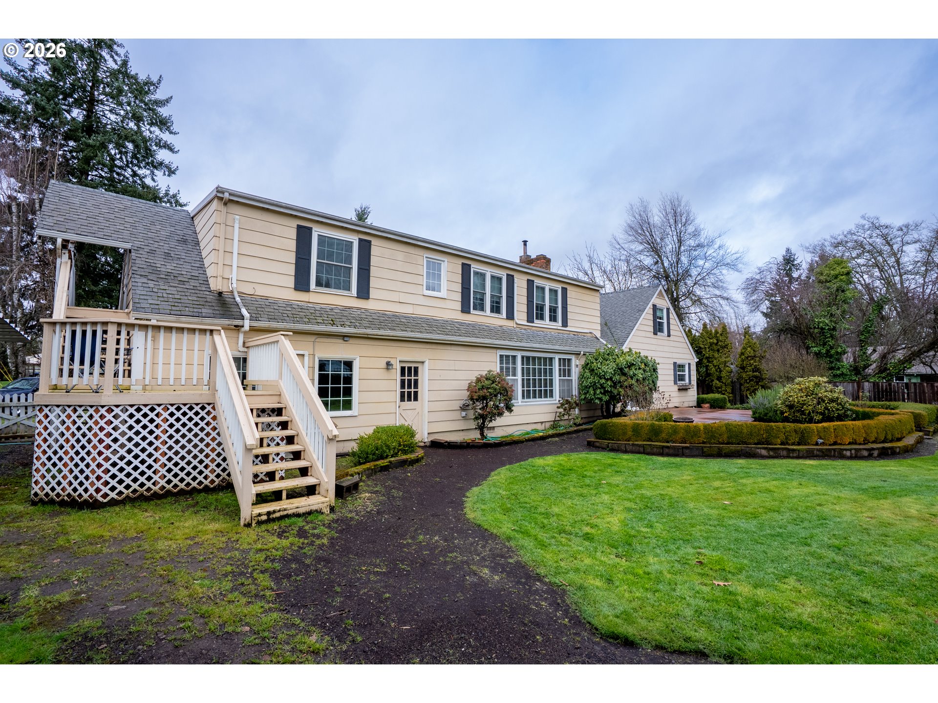 825 Filbert Avenue Eugene, OR 97404 - Photo 31 of 35 a front view of a house with a garden