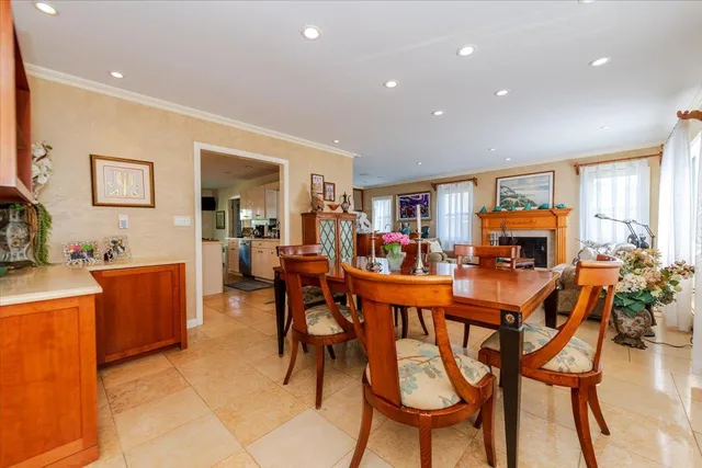 a view of a dining room with furniture and a livingroom