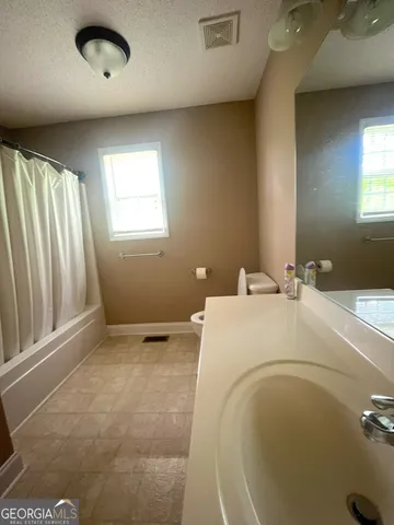 a bathroom with a bathtub