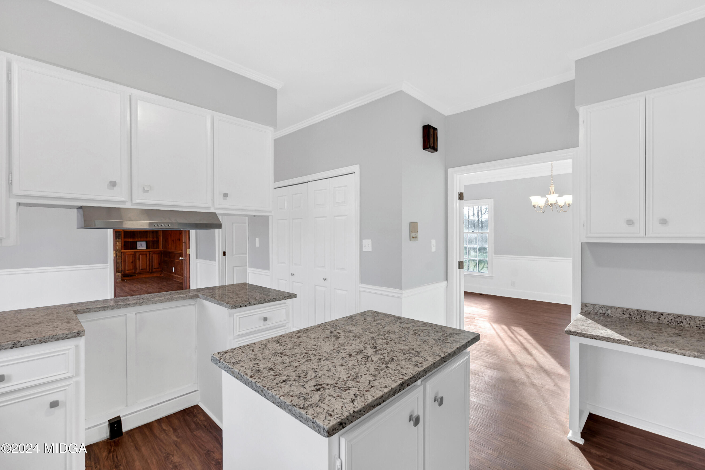 401 Stone Edge Road Macon, GA 31210 - Photo 15 of 69 a kitchen with granite countertop a stove a sink and a microwave