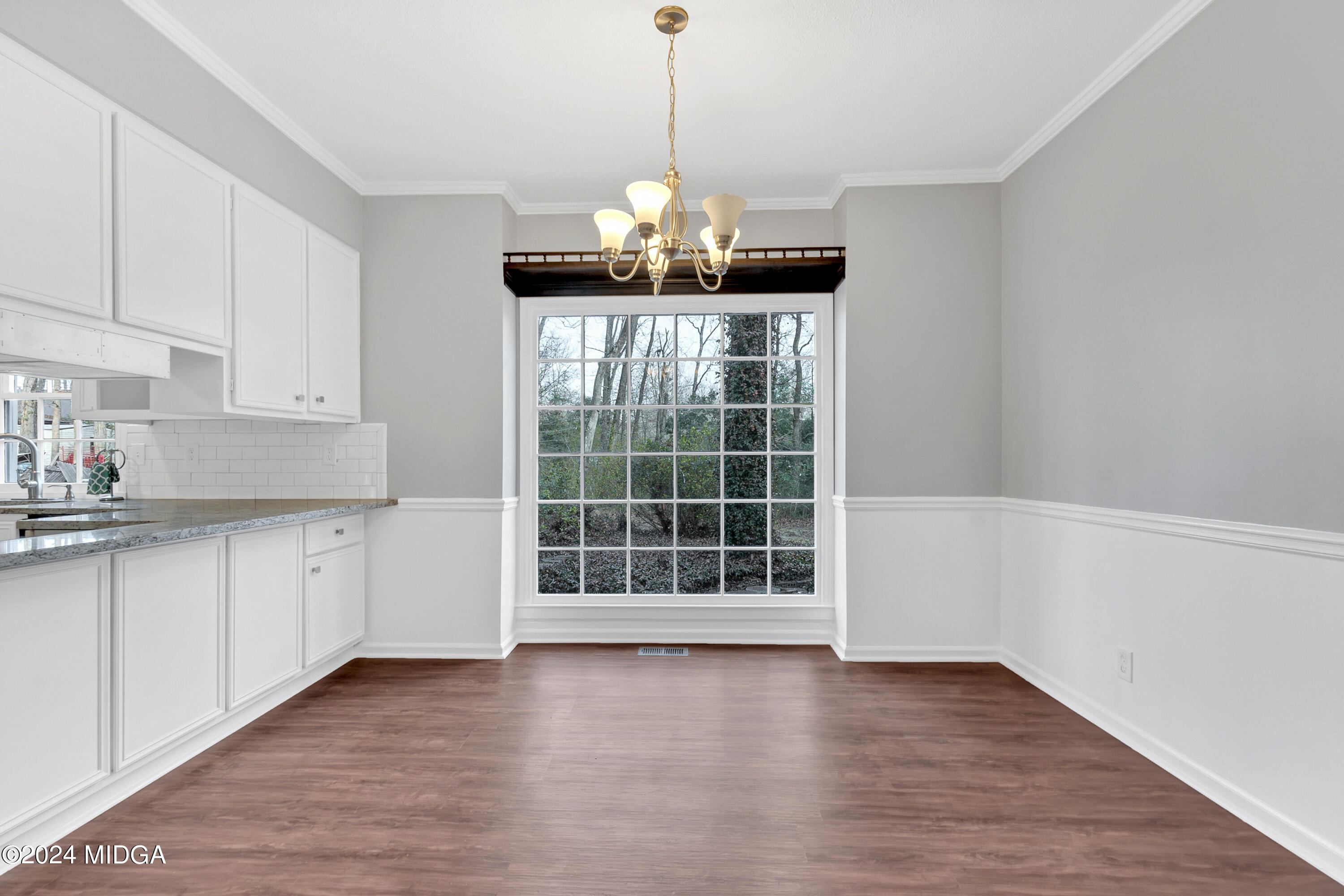 401 Stone Edge Road Macon, GA 31210 - Photo 21 of 69 a view of a kitchen with wooden floor and a sink