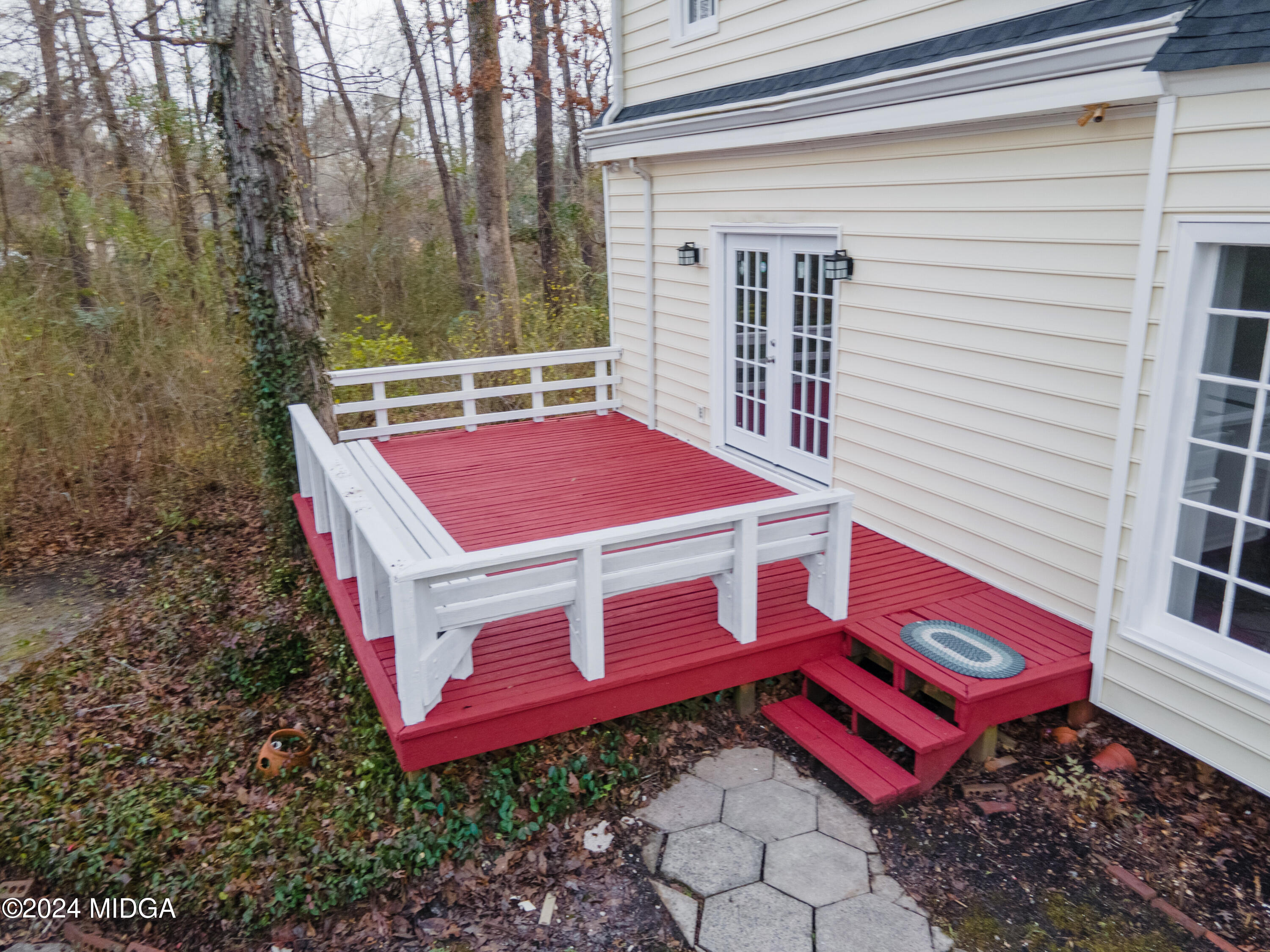 401 Stone Edge Road Macon, GA 31210 - Photo 58 of 69 a view of a yard with red door