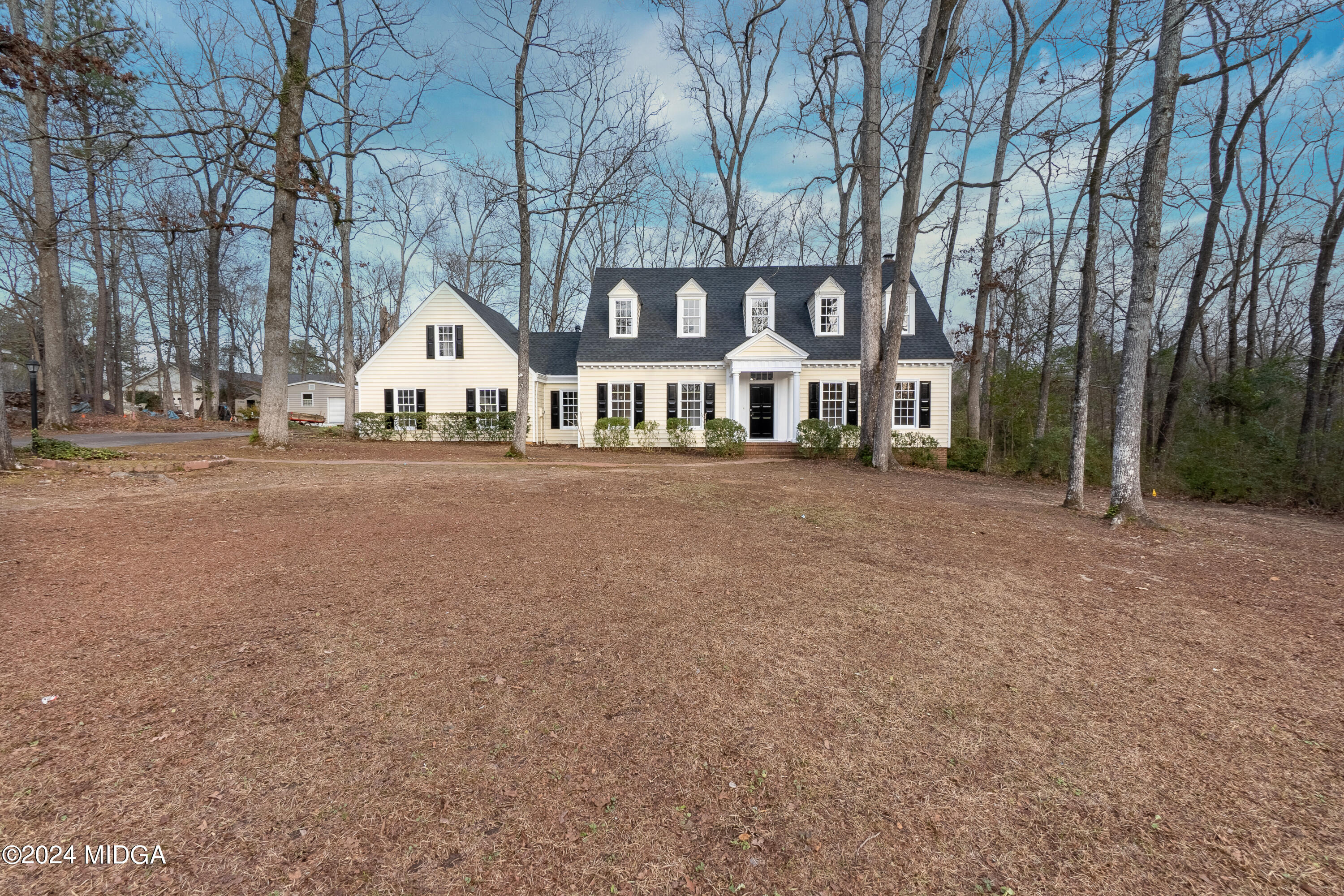 401 Stone Edge Road Macon, GA 31210 - Photo 67 of 69 front view of a house with a yard