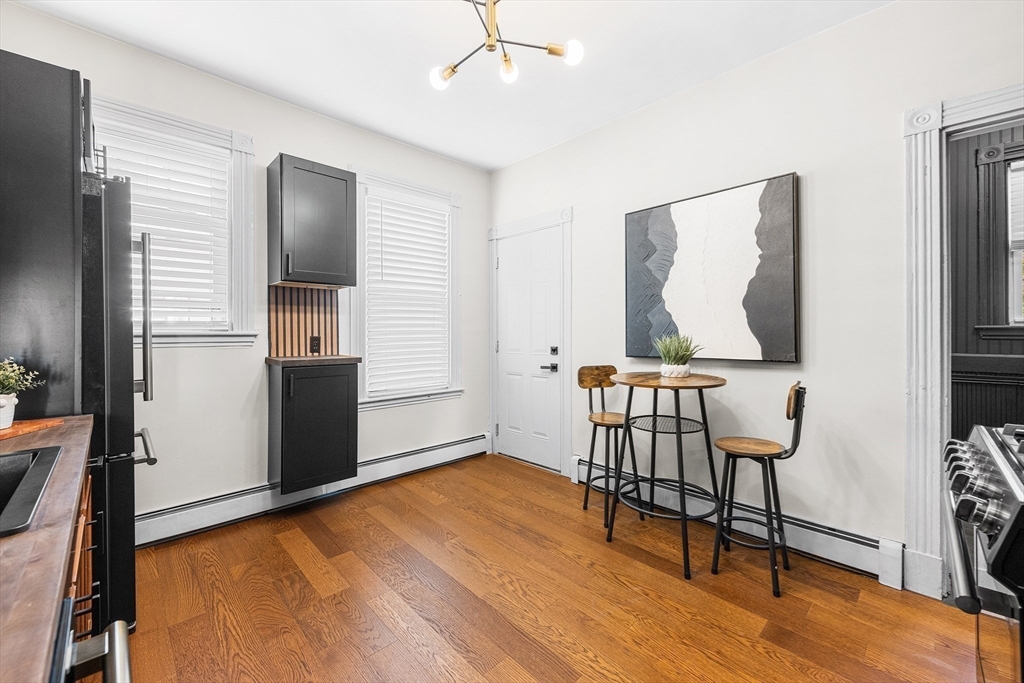 8 Spring Garden Street, Unit 3 Boston, MA 02125 - Photo 13 of 37 a view of a livingroom with furniture