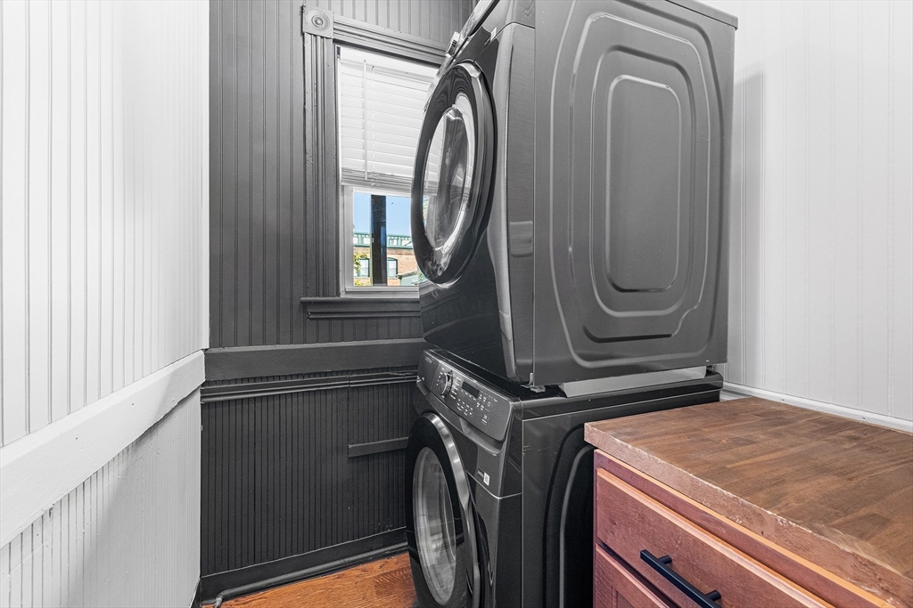 8 Spring Garden Street, Unit 3 Boston, MA 02125 - Photo 19 of 37 a utility room with dryer and washer